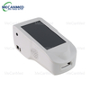 Lub sleek, dawb MECANMED portable electrolyte analyzer nrog ib tug loj zaub, showcasing nws compact thiab niaj hnub tsim.